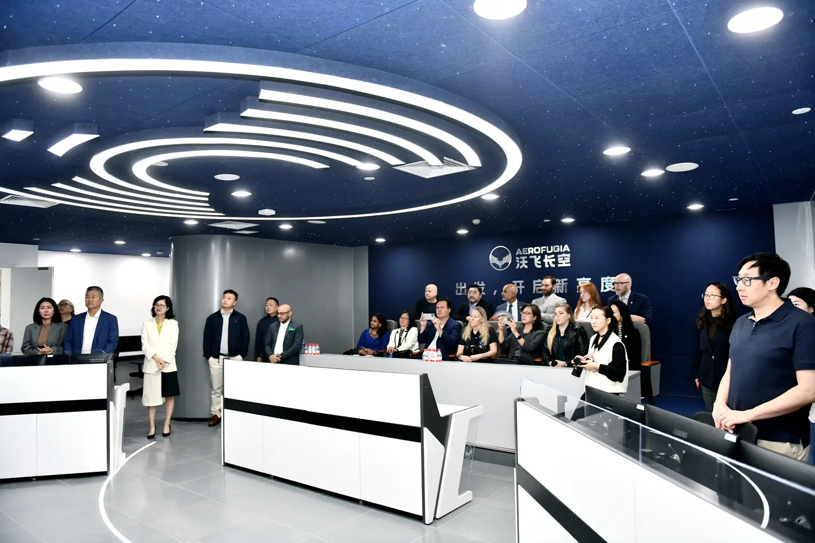 Participants in a futuristic company control room