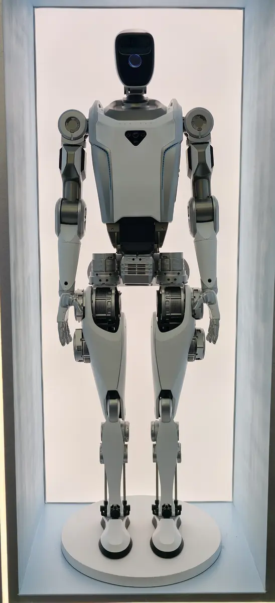 A humanoid robot displayed in an illuminated showcase