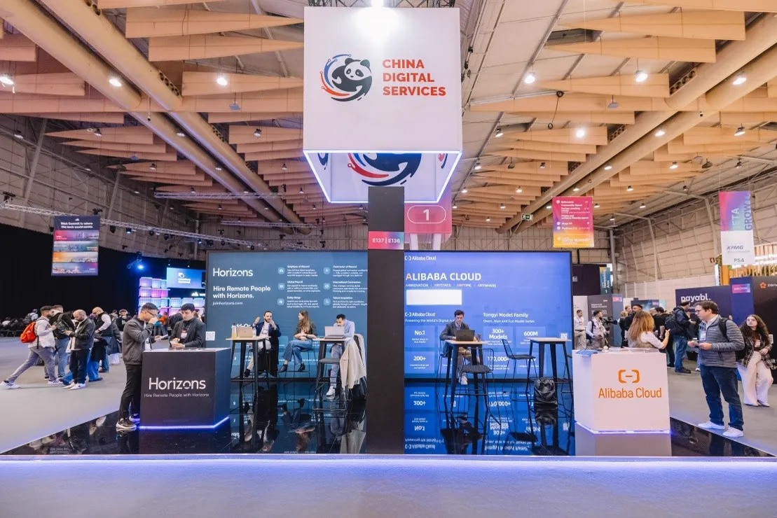 The China Pavilion at Web Summit Lisbon, with visitors at company exhibition stands